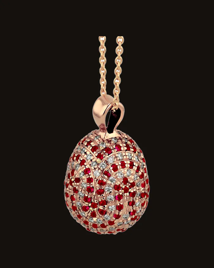 Egg pendant in rose gold set all over with rubies and diamonds