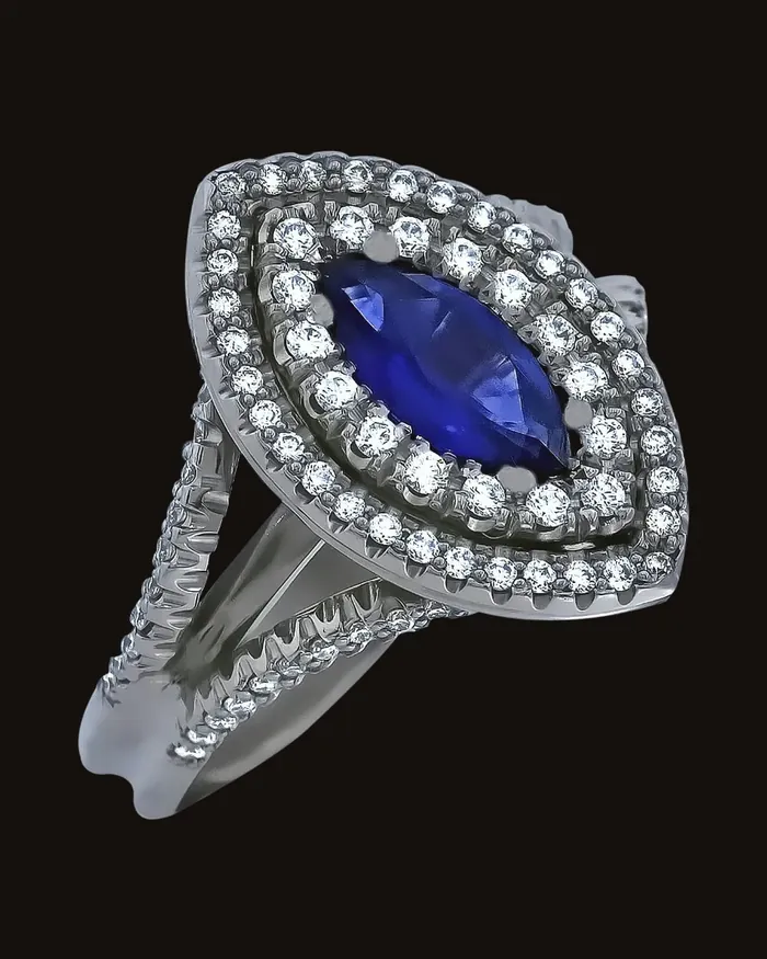 Marquise blue sapphire in two rows of diamonds, white gold